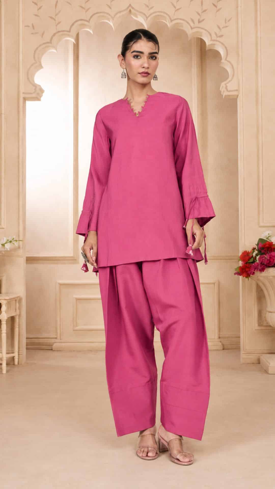 Pink A-line kurti and frashi pants salwar suit